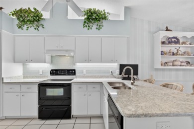 METICULOUSLY MAINTAINED 3 BEDROOM, 2 BATH, 2-CAR GARAGE POOL on Pinemoor West Golf Club in Florida - for sale on GolfHomes.com, golf home, golf lot