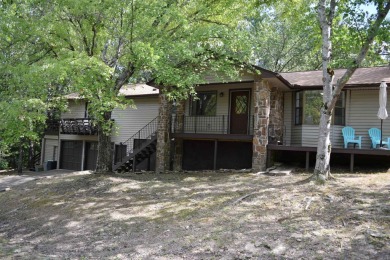 Beautifully Remodeled Retreat with Modern Comforts! Welcome to on Indian Hills Country Club in Arkansas - for sale on GolfHomes.com, golf home, golf lot