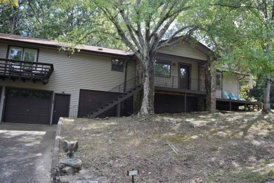 Beautifully Remodeled Retreat with Modern Comforts! Welcome to on Indian Hills Country Club in Arkansas - for sale on GolfHomes.com, golf home, golf lot