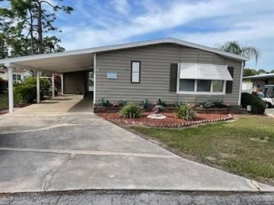 TIRED OF SNOW, ICE AND COLD. MIGHT WANT TO START THINKING ABOUT on Lake Fairways Country Club in Florida - for sale on GolfHomes.com, golf home, golf lot