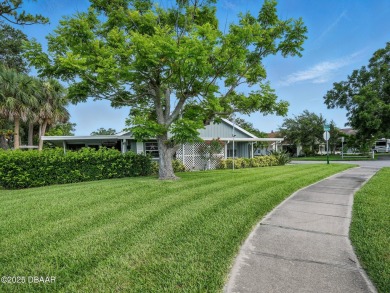 Tucked away in Fairgreen Estates on a manicured landscaped on New Smyrna Beach Golf Course in Florida - for sale on GolfHomes.com, golf home, golf lot