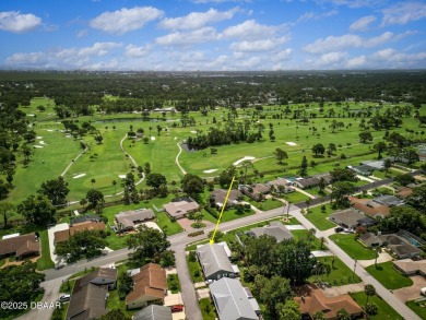 Tucked away in Fairgreen Estates on a manicured landscaped on New Smyrna Beach Golf Course in Florida - for sale on GolfHomes.com, golf home, golf lot