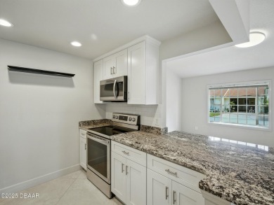 Tucked away in Fairgreen Estates on a manicured landscaped on New Smyrna Beach Golf Course in Florida - for sale on GolfHomes.com, golf home, golf lot