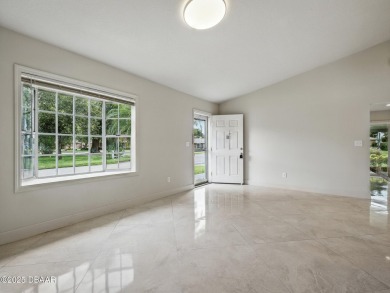Tucked away in Fairgreen Estates on a manicured landscaped on New Smyrna Beach Golf Course in Florida - for sale on GolfHomes.com, golf home, golf lot