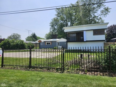 SINGLE FAMILY HOME plus GUEST COTTAGE HOUSE with 2335 Sq. Ft on Cattails Golf Course in Indiana - for sale on GolfHomes.com, golf home, golf lot