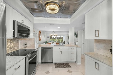 PANORAMIC GOLF COURSE AND LAKE VIEWS from every space in this on Ocean Club At the Hutchinson Island Beach Resort in Florida - for sale on GolfHomes.com, golf home, golf lot