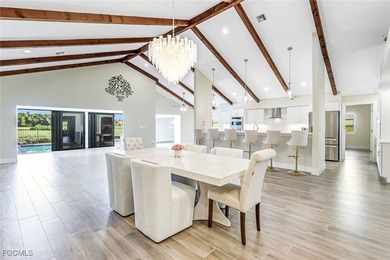This beautifully reimagined 3-bedroom home with a private den on The Forest Country Club in Florida - for sale on GolfHomes.com, golf home, golf lot