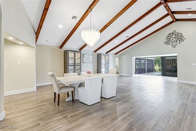 This beautifully reimagined 3-bedroom home with a private den on The Forest Country Club in Florida - for sale on GolfHomes.com, golf home, golf lot