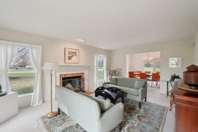 Timeless Richard Adams Russell design in prestigious Travis on Travis Pointe Country Club in Michigan - for sale on GolfHomes.com, golf home, golf lot
