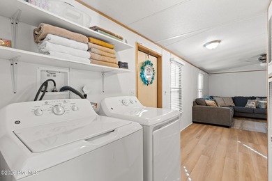 Welcome to the ultimate turnkey escape! Just a few miles from on Brick Landing Plantation Yacht and Golf Club in North Carolina - for sale on GolfHomes.com, golf home, golf lot