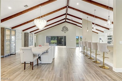 This beautifully reimagined 3-bedroom home with a private den on The Forest Country Club in Florida - for sale on GolfHomes.com, golf home, golf lot