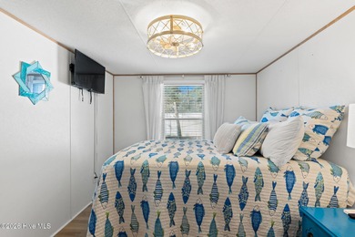 Welcome to the ultimate turnkey escape! Just a few miles from on Brick Landing Plantation Yacht and Golf Club in North Carolina - for sale on GolfHomes.com, golf home, golf lot