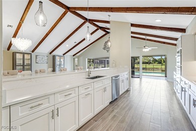 This beautifully reimagined 3-bedroom home with a private den on The Forest Country Club in Florida - for sale on GolfHomes.com, golf home, golf lot