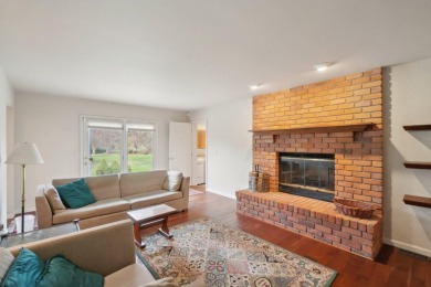 Timeless Richard Adams Russell design in prestigious Travis on Travis Pointe Country Club in Michigan - for sale on GolfHomes.com, golf home, golf lot
