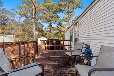 Welcome to the ultimate turnkey escape! Just a few miles from on Brick Landing Plantation Yacht and Golf Club in North Carolina - for sale on GolfHomes.com, golf home, golf lot