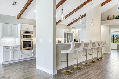 This beautifully reimagined 3-bedroom home with a private den on The Forest Country Club in Florida - for sale on GolfHomes.com, golf home, golf lot