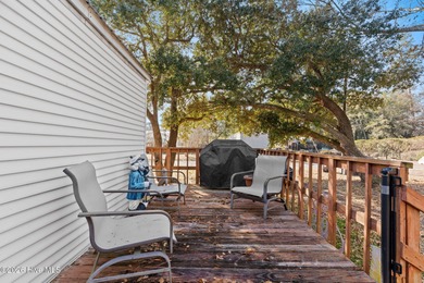 Welcome to the ultimate turnkey escape! Just a few miles from on Brick Landing Plantation Yacht and Golf Club in North Carolina - for sale on GolfHomes.com, golf home, golf lot