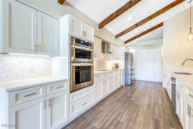 This beautifully reimagined 3-bedroom home with a private den on The Forest Country Club in Florida - for sale on GolfHomes.com, golf home, golf lot