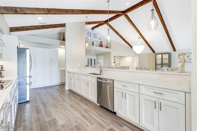 This beautifully reimagined 3-bedroom home with a private den on The Forest Country Club in Florida - for sale on GolfHomes.com, golf home, golf lot