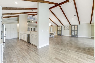 This beautifully reimagined 3-bedroom home with a private den on The Forest Country Club in Florida - for sale on GolfHomes.com, golf home, golf lot