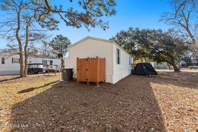 Welcome to the ultimate turnkey escape! Just a few miles from on Brick Landing Plantation Yacht and Golf Club in North Carolina - for sale on GolfHomes.com, golf home, golf lot