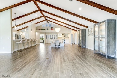 This beautifully reimagined 3-bedroom home with a private den on The Forest Country Club in Florida - for sale on GolfHomes.com, golf home, golf lot