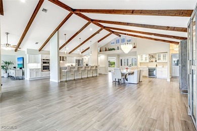 This beautifully reimagined 3-bedroom home with a private den on The Forest Country Club in Florida - for sale on GolfHomes.com, golf home, golf lot