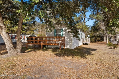 Welcome to the ultimate turnkey escape! Just a few miles from on Brick Landing Plantation Yacht and Golf Club in North Carolina - for sale on GolfHomes.com, golf home, golf lot