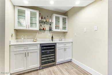 This beautifully reimagined 3-bedroom home with a private den on The Forest Country Club in Florida - for sale on GolfHomes.com, golf home, golf lot