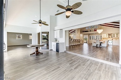 This beautifully reimagined 3-bedroom home with a private den on The Forest Country Club in Florida - for sale on GolfHomes.com, golf home, golf lot