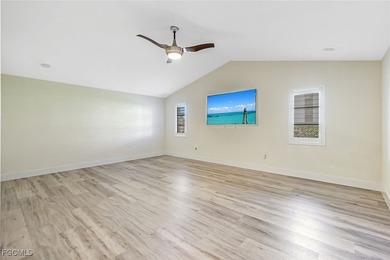 This beautifully reimagined 3-bedroom home with a private den on The Forest Country Club in Florida - for sale on GolfHomes.com, golf home, golf lot