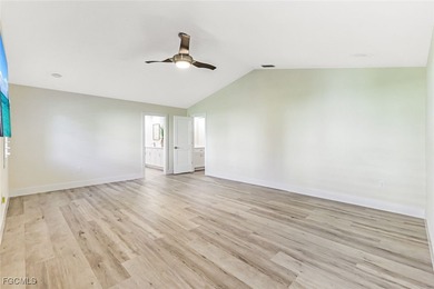 This beautifully reimagined 3-bedroom home with a private den on The Forest Country Club in Florida - for sale on GolfHomes.com, golf home, golf lot