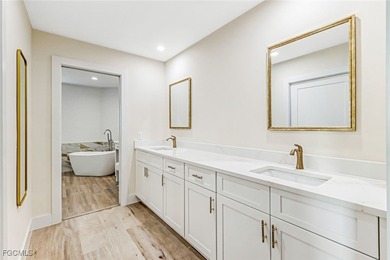 This beautifully reimagined 3-bedroom home with a private den on The Forest Country Club in Florida - for sale on GolfHomes.com, golf home, golf lot