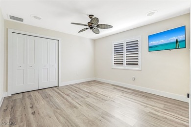 This beautifully reimagined 3-bedroom home with a private den on The Forest Country Club in Florida - for sale on GolfHomes.com, golf home, golf lot