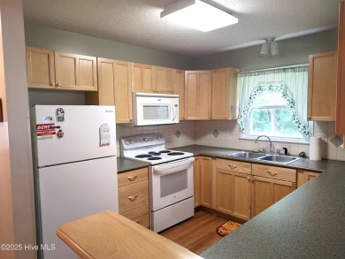 Convenient and Practical!  2 Bedroom townhome with loads of curb on River Bend Golf and Country Club in North Carolina - for sale on GolfHomes.com, golf home, golf lot