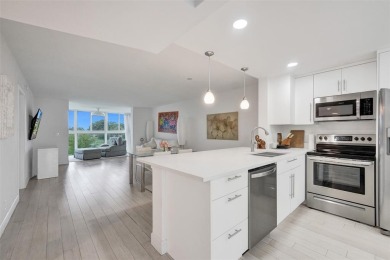 Bright and upgraded 2-bedroom 2-bath condo in a 55+ community on Oriole Golf and Tennis Club in Florida - for sale on GolfHomes.com, golf home, golf lot