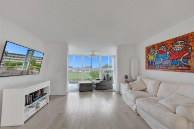 Bright and upgraded 2-bedroom 2-bath condo in a 55+ community on Oriole Golf and Tennis Club in Florida - for sale on GolfHomes.com, golf home, golf lot