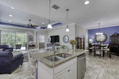 This one truly stands out from the rest! Nestled in the vibrant on LPGA International Golf Course in Florida - for sale on GolfHomes.com, golf home, golf lot