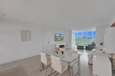 Bright and upgraded 2-bedroom 2-bath condo in a 55+ community on Oriole Golf and Tennis Club in Florida - for sale on GolfHomes.com, golf home, golf lot