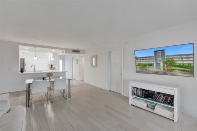 Bright and upgraded 2-bedroom 2-bath condo in a 55+ community on Oriole Golf and Tennis Club in Florida - for sale on GolfHomes.com, golf home, golf lot