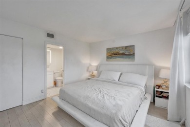 Bright and upgraded 2-bedroom 2-bath condo in a 55+ community on Oriole Golf and Tennis Club in Florida - for sale on GolfHomes.com, golf home, golf lot