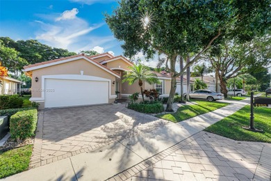 Welcome to this bright and inviting 3BR/2BA home in the on Westchester Golf and Country Club in Florida - for sale on GolfHomes.com, golf home, golf lot