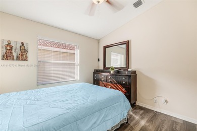 Welcome to this bright and inviting 3BR/2BA home in the on Westchester Golf and Country Club in Florida - for sale on GolfHomes.com, golf home, golf lot