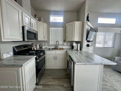 Beautifully maintained like-new, immaculate 2022 CAVCO unit in on Star Valley RV Golf Course in Wyoming - for sale on GolfHomes.com, golf home, golf lot