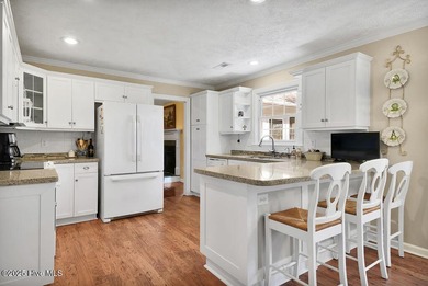 Impeccably maintained brick home positioned on the 8th fairway on Beau Rivage Golf and Resort in North Carolina - for sale on GolfHomes.com, golf home, golf lot