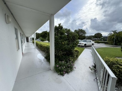 Seller Motivated! This 2 bed, 1.5 bath, ground floor condo in on Hillsboro Pines Golf in Florida - for sale on GolfHomes.com, golf home, golf lot