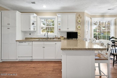 Impeccably maintained brick home positioned on the 8th fairway on Beau Rivage Golf and Resort in North Carolina - for sale on GolfHomes.com, golf home, golf lot