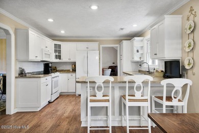 Impeccably maintained brick home positioned on the 8th fairway on Beau Rivage Golf and Resort in North Carolina - for sale on GolfHomes.com, golf home, golf lot