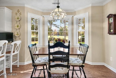 Impeccably maintained brick home positioned on the 8th fairway on Beau Rivage Golf and Resort in North Carolina - for sale on GolfHomes.com, golf home, golf lot