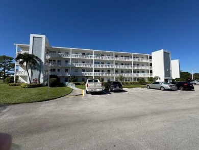 Seller Motivated! This 2 bed, 1.5 bath, ground floor condo in on Hillsboro Pines Golf in Florida - for sale on GolfHomes.com, golf home, golf lot